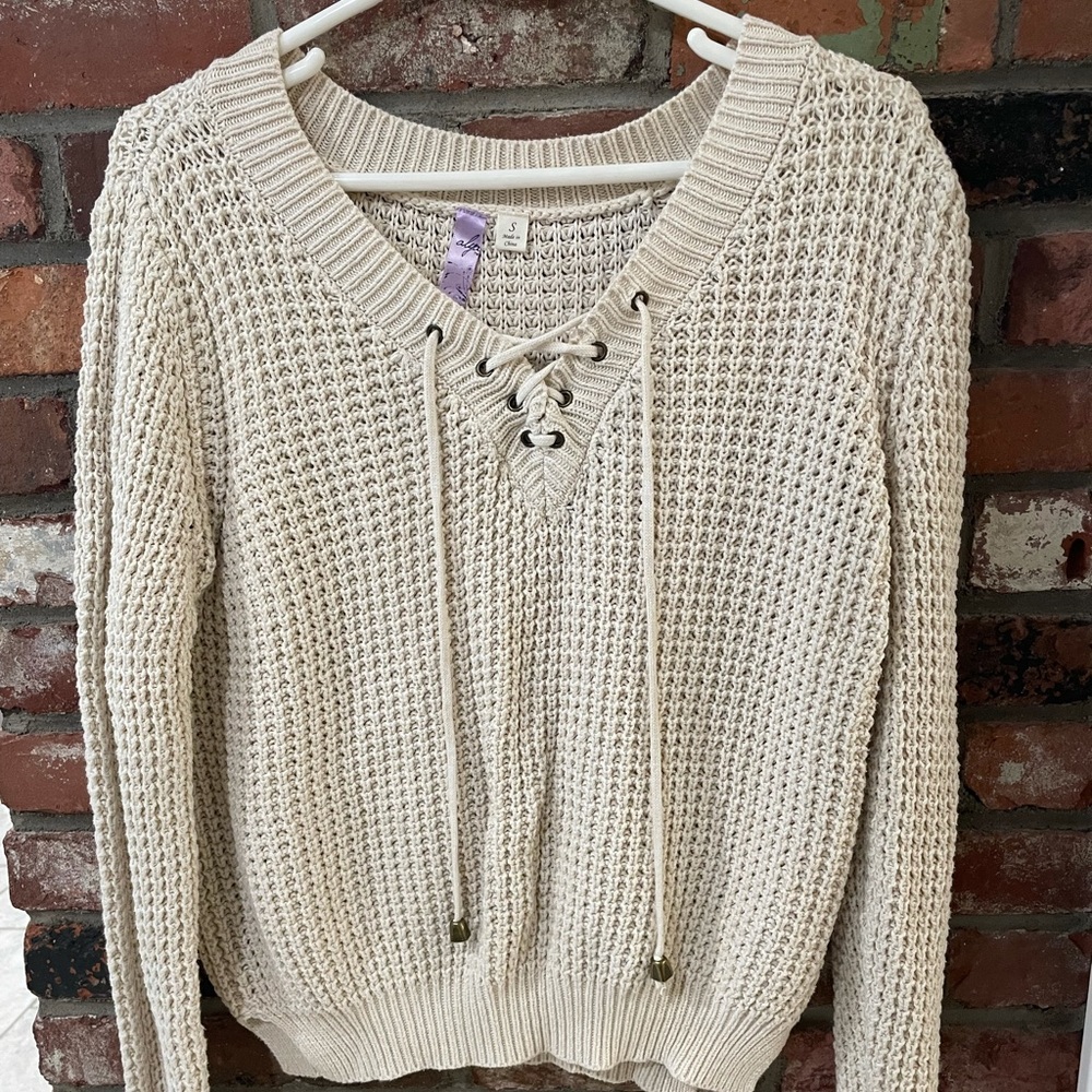 Cream Francesca’s Cable Knit Front Lace Sweater